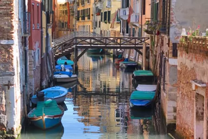 A picture of a cute small canal in Venice, Italy. 