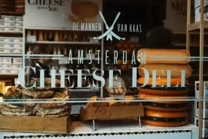 The showcase window of the Amsterdam Cheese Deli by De Mannen - Van Kaas.
