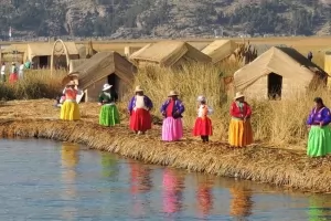 Colorfully dressed women by Lake Titicaca.
